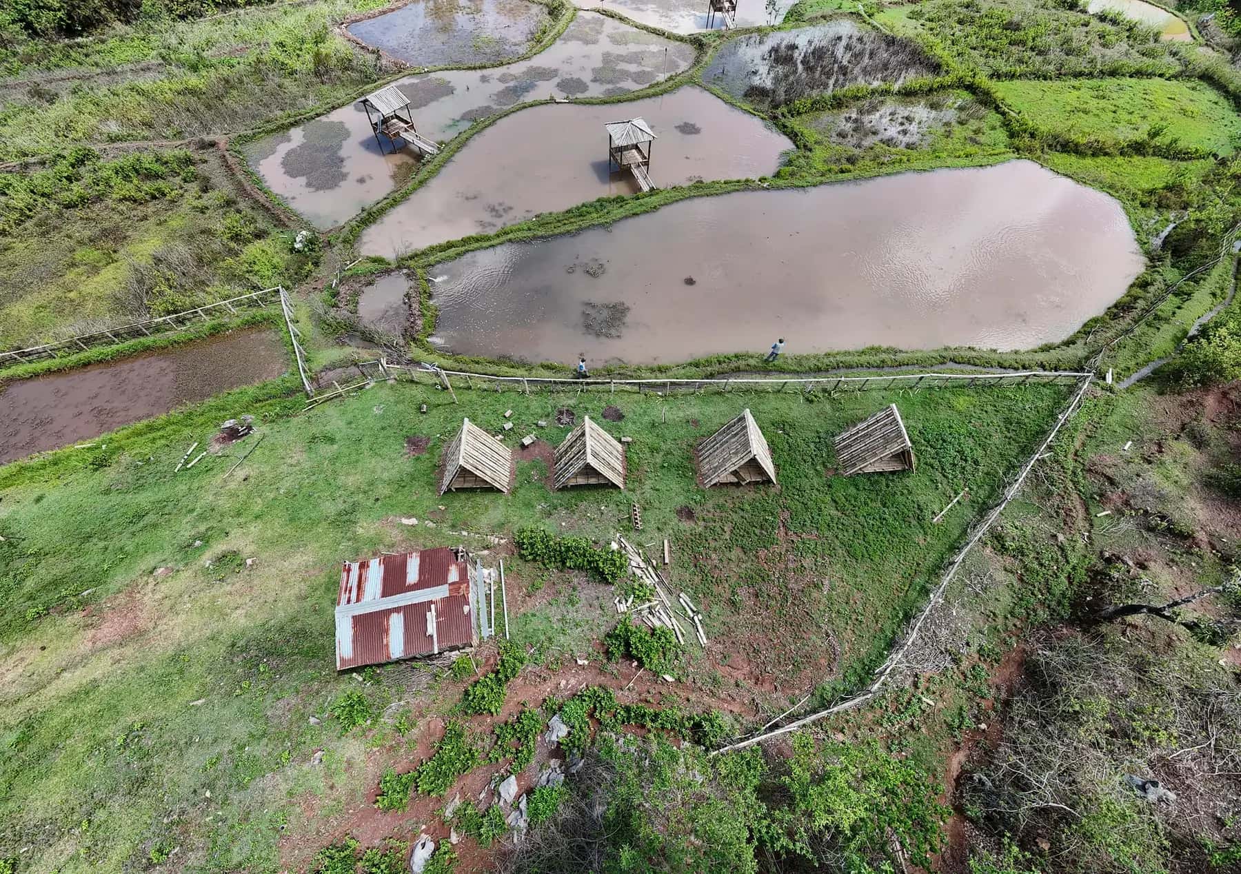 Rice paddies and shelters at the Daisoli eco-tourism site