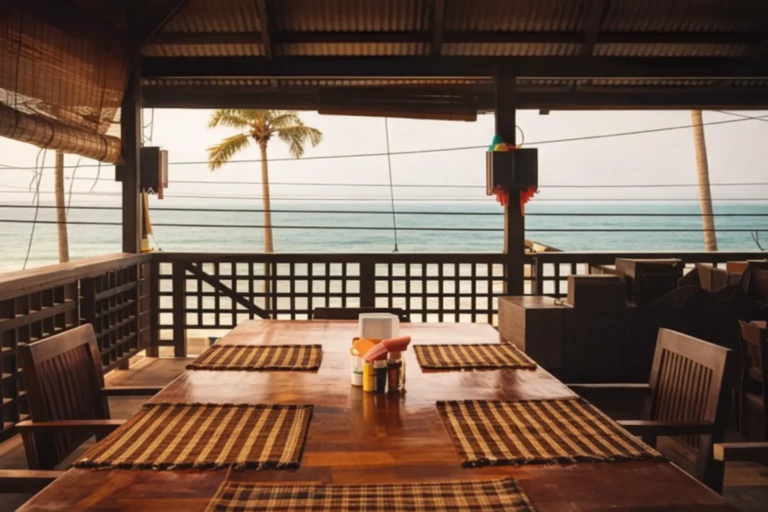 Dining table set beside the water at Sea Breeze Restaurant