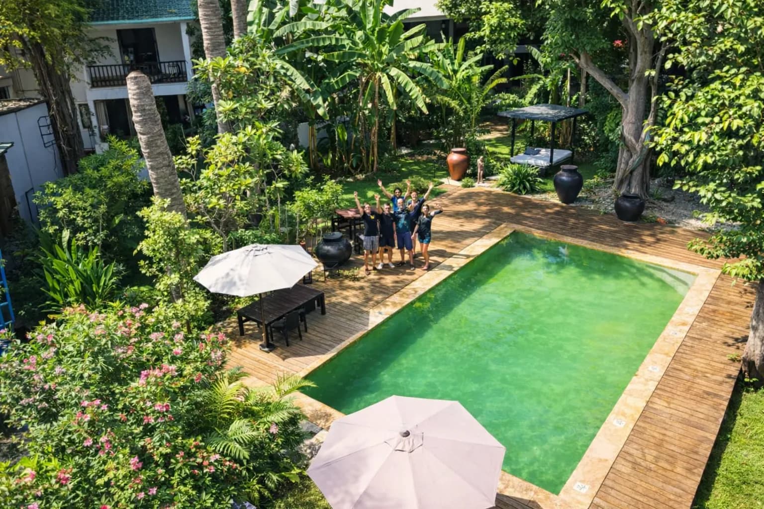 Aerial view of swimming pool with tropical gardens at Hotel Esplanada