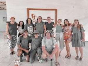 Arbiru Beach Resort group photo of guests in the lobby