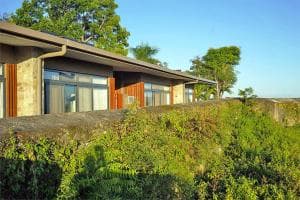 Balibo Fort Hotel suite block with floor-to-ceiling windows on the hilltop