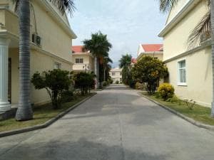 Beach Garden Hotel internal road between villa blocks with palm trees