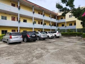Chong Ti Hotel multi-storey exterior with parking forecourt