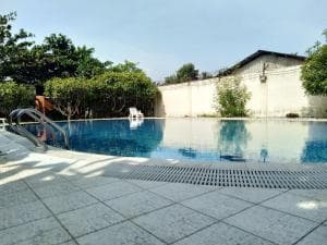 Excelsior Resort outdoor swimming pool with paved deck