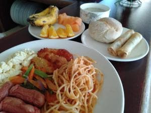 Excelsior Resort buffet plate with spaghetti, sausage and fruit