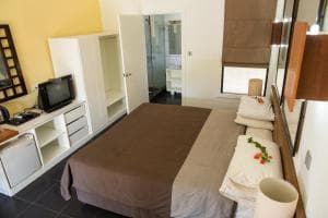 Hotel Esplanada double room with bedside bench, TV cabinet and minibar