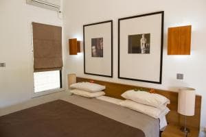 Hotel Esplanada twin-bed room with crisp linens and framed prints