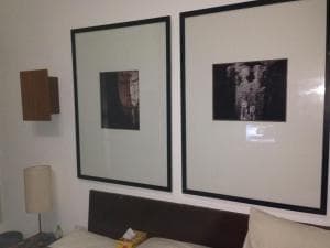 Hotel Esplanada wall art detail — two framed prints in the bedroom