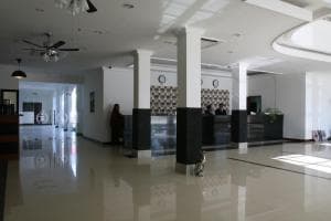 Hotel The Ramelau spacious lobby with multiple reception desks