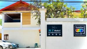 M Y Hotel street-side entrance signage in front of the property