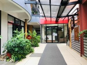 Palm Beach Hotel Dili modern kitchen with stainless appliances and timber cabinets