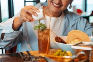 Palm Springs Hotel restaurant — chef garnishing a tropical cocktail