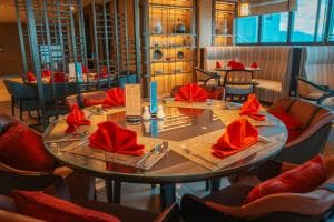 Palm Springs Hotel private dining room with red napkin settings